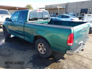 1999 Ford F-150 XL with VIN 1FTRX17L3XNC30010, listed as a IAAI auction lot 41632812 with 268,884 mi miles. Bid and sale history available at carsss.com. Image 3.