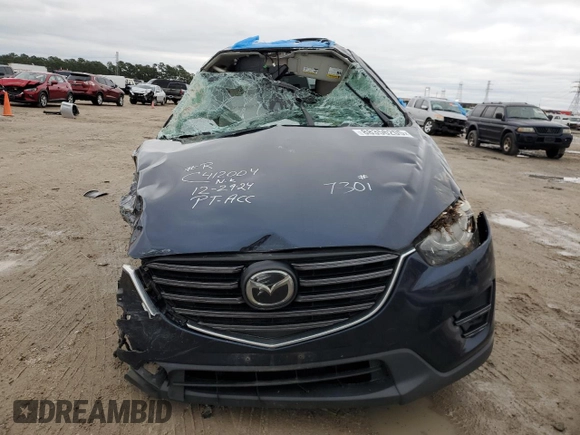 2016 Mazda CX-5 Grand Touring with VIN JM3KE4DY3G0797301, listed as a Copart auction lot 88356205 with Not Provided miles and Non Repairable. Bid and sale history available at carsss.com. Image 5.