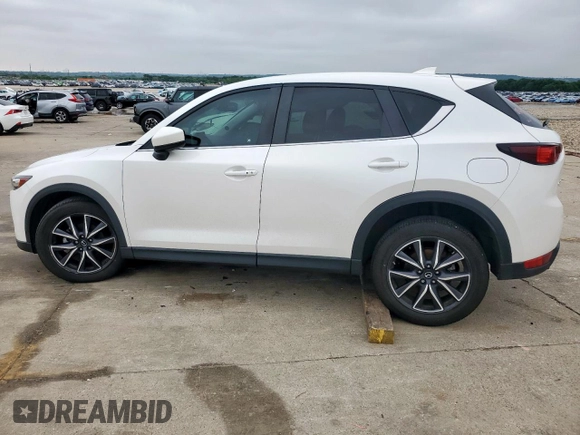 2018 Mazda CX-5 Touring z VIN JM3KFACM0J0469433, wystawiony jako Copart lot #54349955 z przebiegiem Nie podano mil oraz Szkoda całkowita • Salvage title. Historia ofert i sprzedaży dostępna na DreamBid. Obrazek 2.