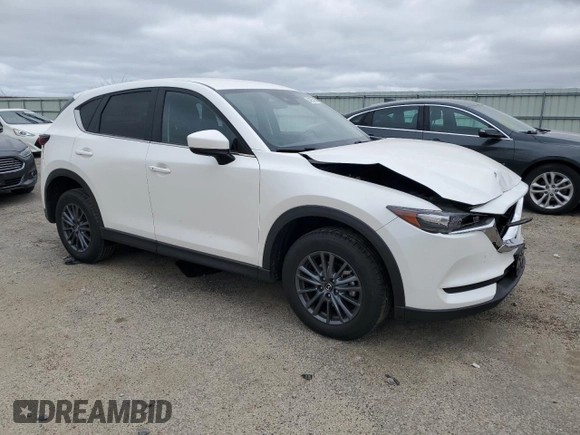 2020 Mazda CX-5 Touring z VIN JM3KFBCM8L1789067, wystawiony jako Copart lot #54953015 z przebiegiem 134 306 mil mil oraz Nie do naprawy • Non repairable. Historia ofert i sprzedaży dostępna na DreamBid. Obrazek 4.