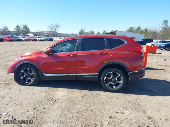 2019 Honda CR-V Touring with VIN 2HKRW1H9XKH500025, listed as a IAAI auction lot 41667564 with 73,889 mi miles. Bid and sale history available at carsss.com. Image 14.