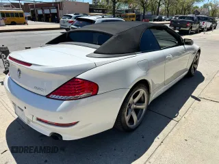 2009 BMW 6 Series 650i with VIN WBAEB53599C224302, listed as a Copart auction lot 55150865 with 123,706 mi miles and Salvage Title. Bid and sale history available at carsss.com. Image 4.