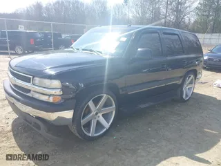 2003 Chevrolet Tahoe LT with VIN 1GNEC13Z73J322783, listed as a IAAI auction lot 41773868 with 259,710 mi miles. Bid and sale history available at carsss.com. Image 2.