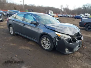 2015 Toyota Avalon Hybrid XLE Touring with VIN 4T1BD1EB2FU042051, listed as a IAAI auction lot 41346573 with 99,324 mi miles. Bid and sale history available at carsss.com. Image 1.