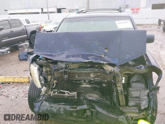 2013 Honda Pilot Touring with VIN 5FNYF4H95DB007125, listed as a IAAI auction lot 42493693 with Not provided miles and . Bid and sale history available at DreamBid. Image 12.