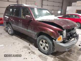 2000 Toyota Land Cruiser with VIN JT3HT05J2Y0102508, listed as a IAAI auction lot 41596418 with 271,327 mi miles. Bid and sale history available at carsss.com. Image 1.