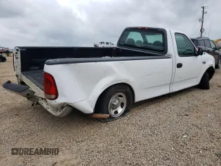 2001 Ford F-150 XL with VIN 3FTZF17201MA44310, listed as a Copart auction lot 73794104 with Not provided miles and Salvage title. Bid and sale history available at DreamBid. Image 3.
