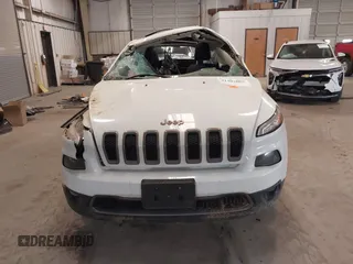 2016 Jeep Cherokee Latitude with VIN 1C4PJMCS1GW314036, listed as a IAAI auction lot 41303805 with 121,551 mi miles. Bid and sale history available at carsss.com. Image 12.