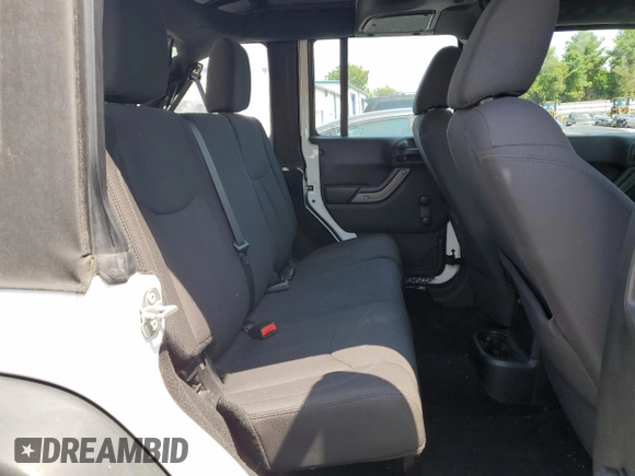 2017 Jeep Wrangler Unlimited Sport with VIN 1C4BJWDG5HL617193, listed as a Copart auction lot 63617355 with 68,304 mi miles and Salvage title. Bid and sale history available at DreamBid. Image 11.