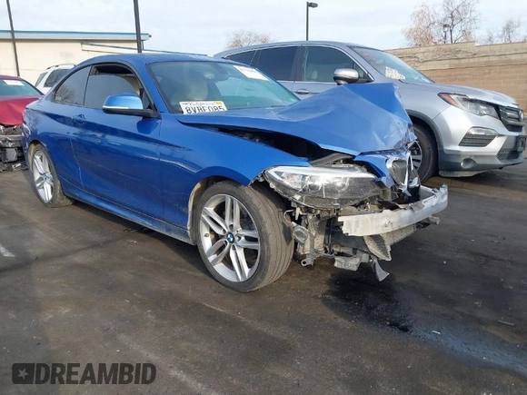 2015 BMW 2 Series 228i with VIN WBA1F5C59FVW98205, listed as a IAAI auction lot 41722804 with 91,879 mi miles. Bid and sale history available at carsss.com. Image 1.