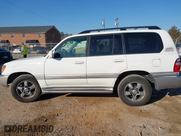 2005 Toyota Land Cruiser z VIN JTEHT05J952078683, wystawiony jako IAAI lot #41769150 z przebiegiem 299 737 mil mil oraz . Historia ofert i sprzedaży dostępna na DreamBid. Obrazek 14.