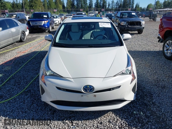 2017 Toyota Prius Two z VIN JTDKARFU1H3033538, wystawiony jako IAAI lot #42362770 z przebiegiem 74 671 mil mil oraz . Historia ofert i sprzedaży dostępna na DreamBid. Obrazek 12.