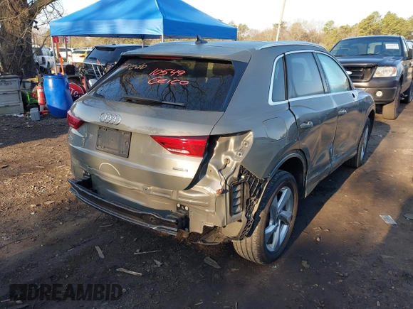 2021 Audi Q3 Premium with VIN WA1AUCF34M1099668, listed as a IAAI auction lot 41990226 with 69,866 mi miles and . Bid and sale history available at DreamBid. Image 6.
