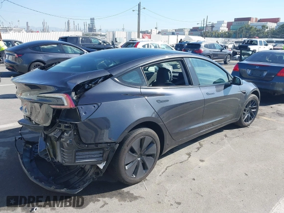 2024 Tesla Model 3 with VIN 5YJ3E1EA7RF717855, listed as a IAAI auction lot 41838814 with 8,750 mi miles and . Bid and sale history available at DreamBid. Image 4.