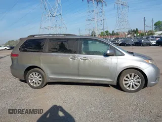 2011 Toyota Sienna LE with VIN 5TDJK3DC9BS012944, listed as a IAAI auction lot 42106998 with 108,700 mi miles. Bid and sale history available at carsss.com. Image 14.