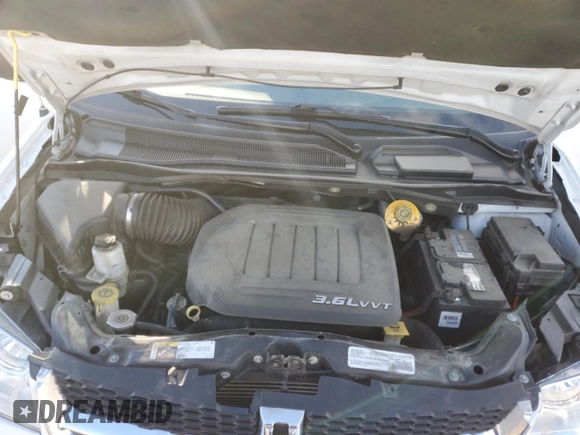 2017 Dodge Grand Caravan SE with VIN 2C4RDGBG1HR646616, listed as a Copart auction lot 87414584 with 80,318 mi miles and Salvage Title. Bid and sale history available at DreamBid. Image 13.