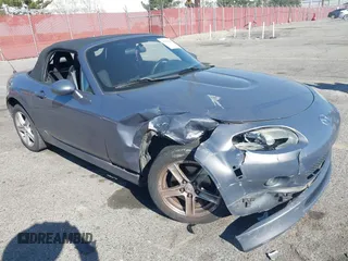 2006 Mazda MX-5 Miata Touring z VIN JM1NC25F960112536, wystawiony jako IAAI lot #41868290 z przebiegiem 153 162 mil mil oraz . Historia ofert i sprzedaży dostępna na DreamBid. Obrazek 1.
