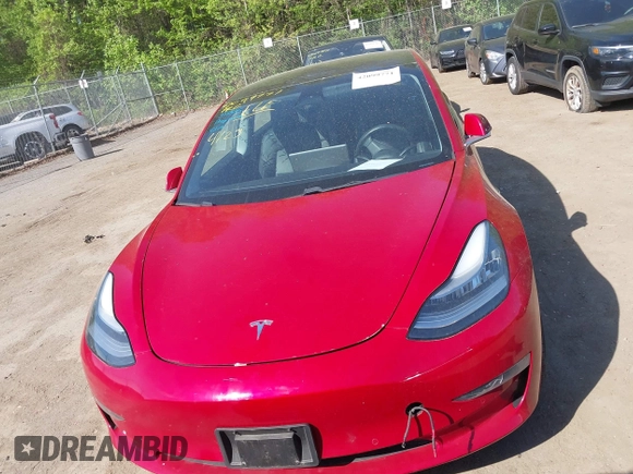 2018 Tesla Model 3 Long Range Battery z VIN 5YJ3E1EA3JF047287, wystawiony jako IAAI lot #42099771 z przebiegiem 120 470 mil mil oraz . Historia ofert i sprzedaży dostępna na DreamBid. Obrazek 11.