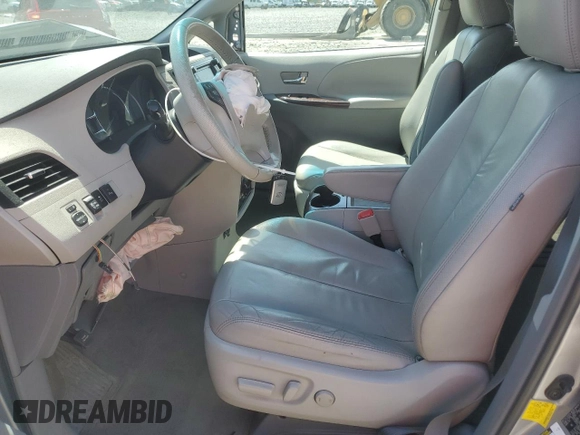 2012 Toyota Sienna XLE AAS z VIN 5TDYK3DC5CS177650, wystawiony jako Copart lot #53832525 z przebiegiem Nie podano mil oraz Szkoda całkowita • Salvage title. Historia ofert i sprzedaży dostępna na DreamBid. Obrazek 7.