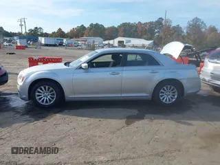 2012 Chrysler 300 with VIN 2C3CCAAG6CH104745, listed as a IAAI auction lot 40708856 with 125,186 mi miles. Bid and sale history available at carsss.com. Image 14.