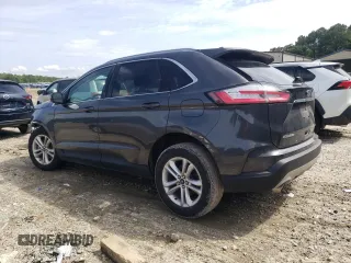 2020 Ford Edge SEL с VIN 2FMPK3J97LBB39094, выставлен на аукционе Copart как лот 58571215 с пробегом 95 329 миль миль и Списание • Salvage title. История ставок и продаж доступна на DreamBid. Изображение 2.