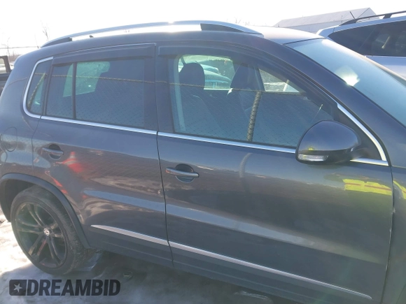 2016 Volkswagen Tiguan S with VIN WVGBV7AX9GW616488, listed as a IAAI auction lot 41402119 with 66,288 mi miles and . Bid and sale history available at DreamBid. Image 13.