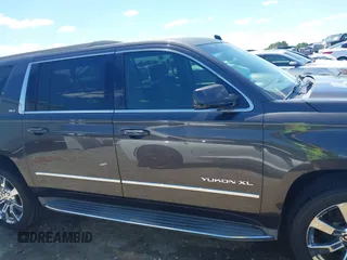 2015 GMC Yukon XL SLT z VIN 1GKS2HKC6FR122234, wystawiony jako IAAI lot #42325984 z przebiegiem 241 008 mil mil oraz . Historia ofert i sprzedaży dostępna na DreamBid. Obrazek 14.