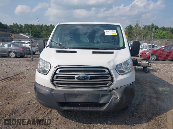 2015 Ford Transit Cargo z VIN 1FTNR1ZM5FKA65799, wystawiony jako IAAI lot #42473586 z przebiegiem 99 756 mil mil oraz . Historia ofert i sprzedaży dostępna na DreamBid. Obrazek 12.