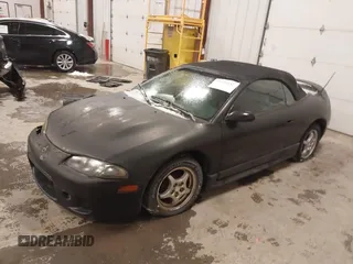 1999 Mitsubishi Eclipse GS with VIN 4A3AX35G3XE061702, listed as a IAAI auction lot 41323151 with 155,941 mi miles. Bid and sale history available at carsss.com. Image 2.