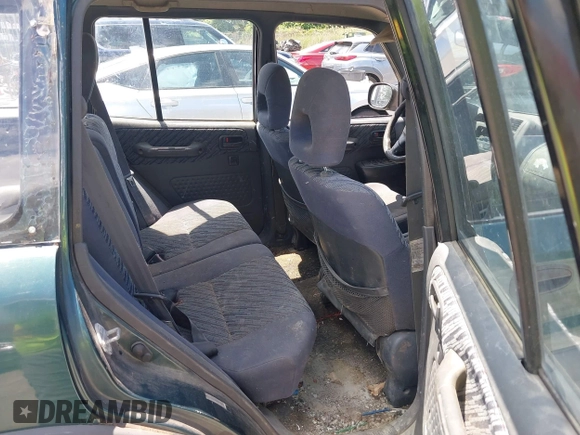 1998 Toyota RAV4 with VIN JT3GP10V6W0023680, listed as a IAAI auction lot 42235877 with 244,446 mi miles and . Bid and sale history available at DreamBid. Image 8.