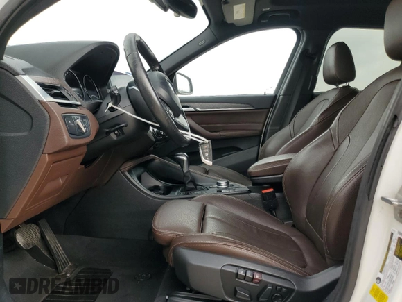 2019 BMW X1 sDrive28i with VIN WBXHU7C57K3H44192, listed as a Copart auction lot 49882335 with 79,350 mi miles and Salvage Title. Bid and sale history available at carsss.com. Image 7.
