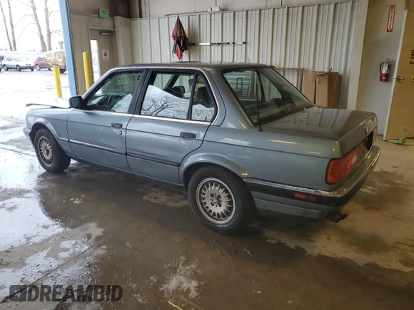 1989 BMW 3 Series 325i with VIN WBAAD2305KED23370, listed as a Copart auction lot 43777225 with 194,949 mi miles and Salvage Title. Bid and sale history available at carsss.com. Image 2.