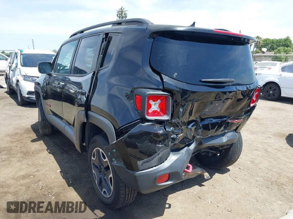 2017 Jeep Renegade Trailhawk z VIN ZACCJBCB4HPE54731, wystawiony jako IAAI lot #42282950 z przebiegiem 101 418 mil mil oraz . Historia ofert i sprzedaży dostępna na DreamBid. Obrazek 3.