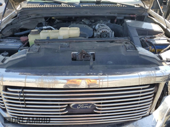 2002 Ford F-250 XL z VIN 1FTNX21F42EC44207, wystawiony jako Copart lot #60615915 z przebiegiem 320 609 mil mil oraz Szkoda całkowita • Salvage title. Historia ofert i sprzedaży dostępna na DreamBid. Obrazek 11.