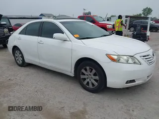 2009 Toyota Camry LE z VIN 4T1BK46K59U592001, wystawiony jako IAAI lot #42286669 z przebiegiem 319 309 mil mil oraz . Historia ofert i sprzedaży dostępna na DreamBid. Obrazek 1.