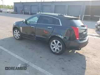 2014 Cadillac SRX Performance Collection with VIN 3GYFNFE35ES663320, listed as a IAAI auction lot 42480235 with 112,406 mi miles and . Bid and sale history available at DreamBid. Image 3.