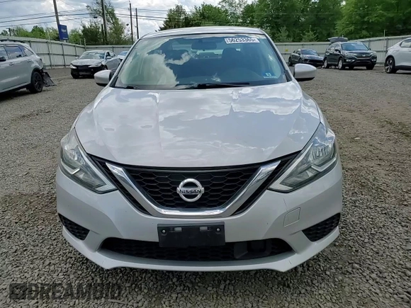 2018 Nissan Sentra S z VIN 3N1AB7AP6JY340671, wystawiony jako Copart lot #56253365 z przebiegiem 101 968 mil mil oraz Szkoda całkowita • Salvage title. Historia ofert i sprzedaży dostępna na DreamBid. Obrazek 13.