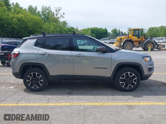 2020 Jeep Compass Trailhawk z VIN 3C4NJDDB0LT221532, wystawiony jako IAAI lot #42310215 z przebiegiem 78 464 mil mil oraz . Historia ofert i sprzedaży dostępna na DreamBid. Obrazek 13.