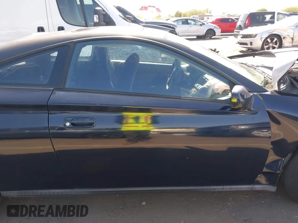2005 Toyota Celica GT z VIN JTDDR32T950182529, wystawiony jako IAAI lot #42466018 z przebiegiem Nie podano mil oraz . Historia ofert i sprzedaży dostępna na DreamBid. Obrazek 14.