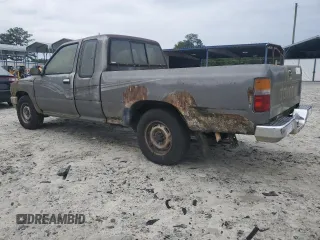 1989 Toyota Pickup DLX z VIN JT4RN93P5K0008068, wystawiony jako Copart lot #58843695 z przebiegiem 285 895 mil mil oraz Tytuł czysty. Historia ofert i sprzedaży dostępna na DreamBid. Obrazek 2.