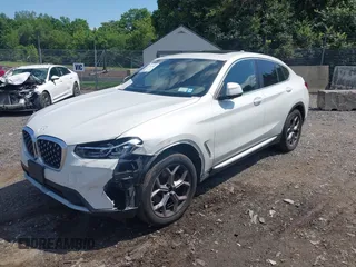 2024 BMW X4 xDrive30i with VIN 5UX33DT02R9W73855, listed as a IAAI auction lot 42712082 with 30,654 mi miles and . Bid and sale history available at DreamBid. Image 6.