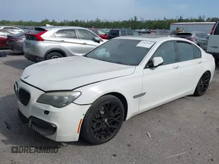 2013 BMW 7 Series 740i with VIN WBAYA6C52DD143862, listed as a IAAI auction lot 41859183 with 133,666 mi miles. Bid and sale history available at carsss.com. Image 18.