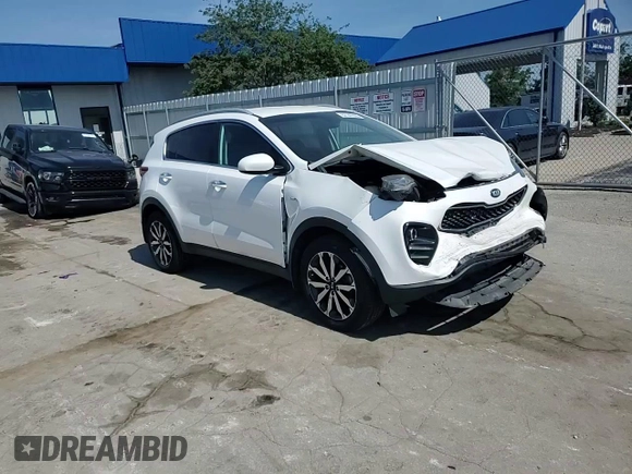 2017 Kia Sportage EX z VIN KNDPNCAC4H7245574, wystawiony jako Copart lot #62147555 z przebiegiem 135 244 mil mil oraz Szkoda całkowita • Salvage title. Historia ofert i sprzedaży dostępna na DreamBid. Obrazek 14.