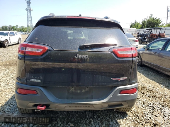 2015 Jeep Cherokee Trailhawk with VIN 1C4PJMBS6FW785891, listed as a Copart auction lot 61040565 with 156,421 mi miles and Clean title. Bid and sale history available at DreamBid. Image 6.