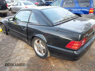 2000 Mercedes-Benz SL-Class with VIN WDBFA68F4YF191528, listed as a IAAI auction lot 41775425 with 86,654 mi miles. Bid and sale history available at carsss.com. Image 3.