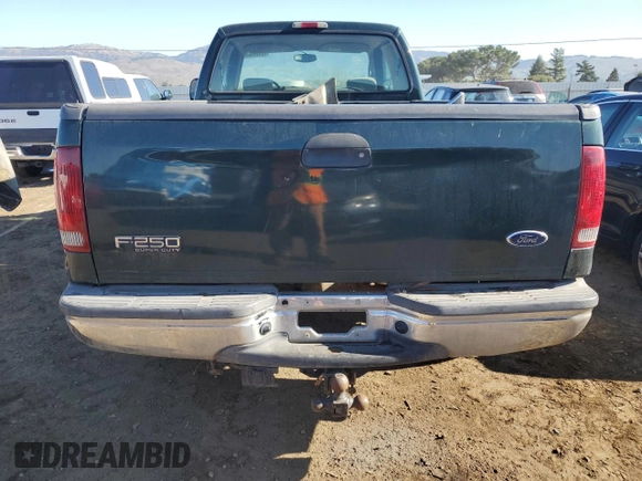 2001 Ford Super Duty F-250 XL with VIN 1FTNX21F21EB60806, listed as a Copart auction lot 42493565 with 142,977 mi miles and Salvage Title. Bid and sale history available at carsss.com. Image 6.