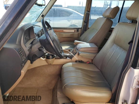 1995 Land Rover Range Rover with VIN SALHC1343SA656651, listed as a Copart auction lot 80172604 with 148,324 mi miles and Salvage title. Bid and sale history available at DreamBid. Image 7.