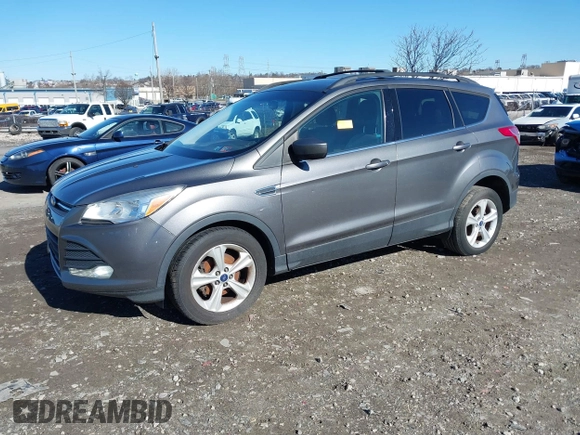 2014 Ford Escape SE with VIN 1FMCU0GXXEUB37821, listed as a IAAI auction lot 41853052 with 197,773 mi miles. Bid and sale history available at carsss.com. Image 2.