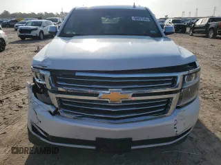 2017 Chevrolet Suburban Premier with VIN 1GNSCJKCXHR348044, listed as a Copart auction lot 55957535 with 112,131 mi miles and Salvage title. Bid and sale history available at DreamBid. Image 5.
