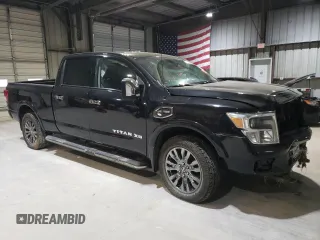 2017 Nissan Titan XD SL with VIN 1N6BA1F48HN561757, listed as a Copart auction lot 87204594 with 100,339 mi miles and Salvage Title. Bid and sale history available at carsss.com. Image 4.